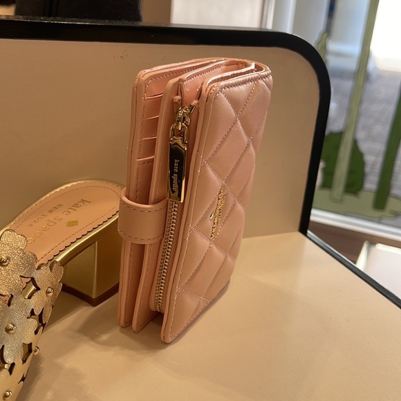 Kate Spade Carey Medium Compartment Bifold Wallet
COLOR: Conch Pink - Picture 8 of 16